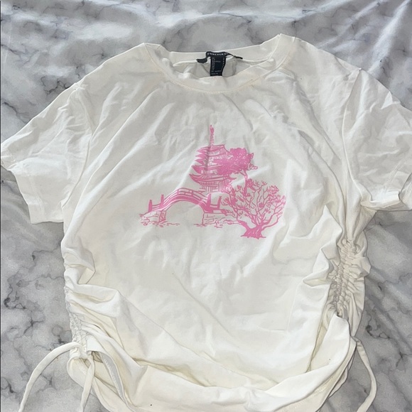 White with pink graphic crop shirt
